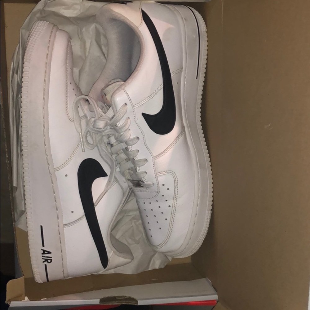 Low air force ones with black stripe
